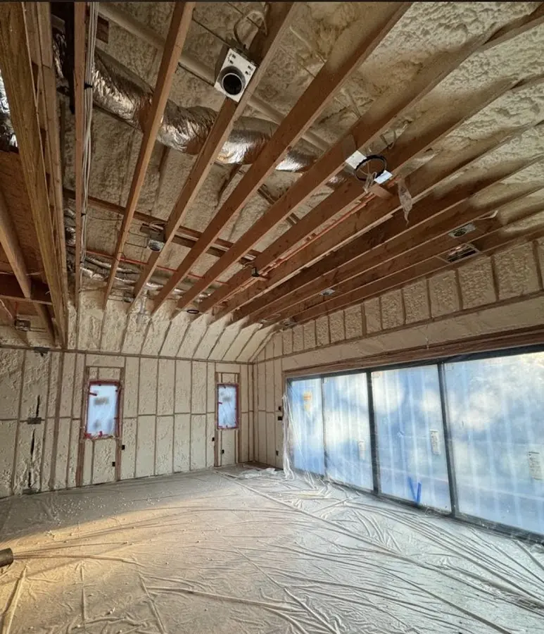 Interior walls and ceiling insulated with spray foam during new construction in St. Joseph